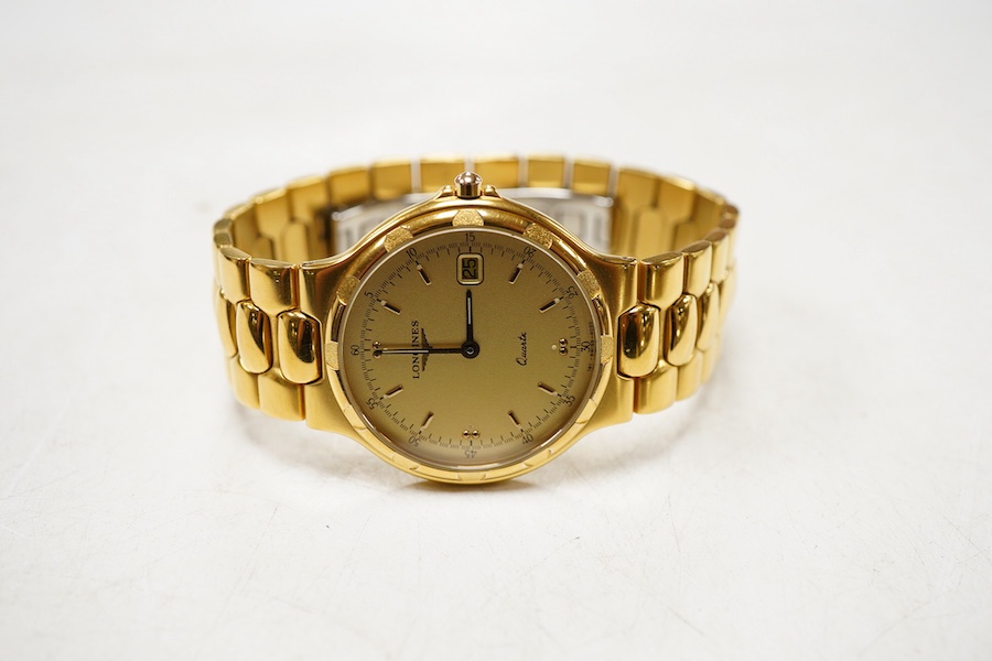 A gentleman's early 1990's stainless steel and gold plated Longines quartz wrist watch, with spare links and box, case diameter 34mm.